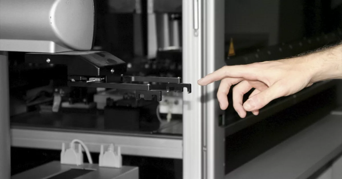 Laboratory robots assist researchers in their work.