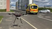 Forerunner drone accompanying moving ambulance and developed by SZE and SZTAKI tested in urban environment